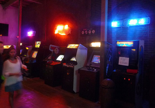 Illustration for article titled A Visit To Flynn's Arcade, The Home of Tron